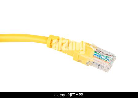 Close-up of the RJ-45 network connection plug of the yellow Ethernet cable of the LAN network connection. White background, copy space. Stock Photo