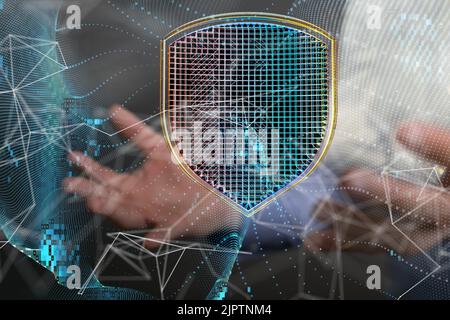 The Information technology protected with firewall on the background of human hands Stock Photo