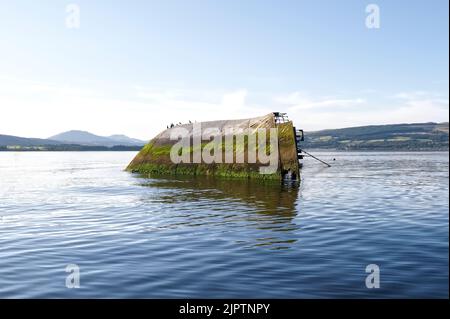 Shipwreck sugar boat at sea on the River Clyde viewed from Firth of Forth Scotland Stock Photo