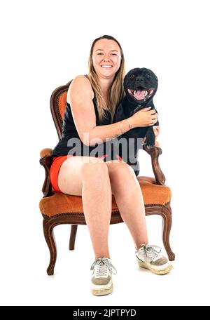 staffordshire bull terrier and woman in front of white background Stock Photo