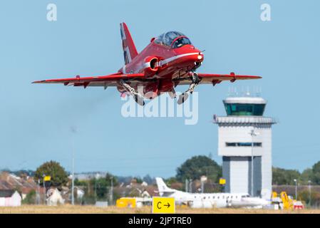London Southend Airport, Essex, UK. 20th Aug, 2022. The RAF’s Red Arrows are using the civilian airport to operate from for this weekend’s airshows at Eastbourne and Folkestone. A Red Arrows BAe Hawk T1 taking off from Southend with the air traffic control tower behind Stock Photo