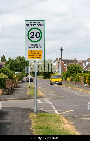 School safety zone advisory speed limit signs and mandatory no stopping zone, Laburnum Drive, Cherry Willingham, Lincolnshire 2022 Stock Photo