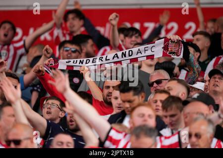 Jubilant Sunderland fans celebrate after their sides 1-0 win at Stoke City Stock Photo