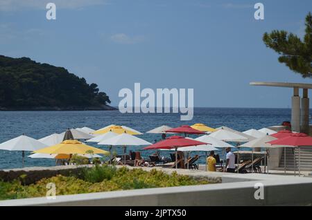 umbrellas by the sea on the beach Stock Photo