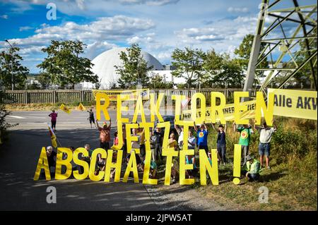 Neckarwestheim, Germany. 20th Aug, 2022. Anti-nuclear activists demonstrate near the nuclear power plant. The demonstration takes place as part of a three-week continuous protest, an anti-nuclear bike tour through southern Germany, Switzerland and France. The aim is to demonstrate for the shutdown of all nuclear power plants. Credit: Ferdinando Iannone/dpa/Alamy Live News Stock Photo