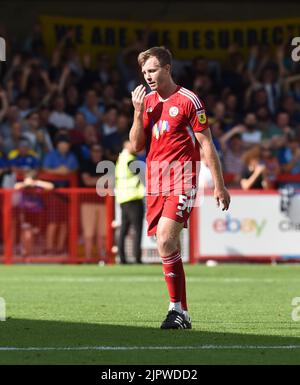 Tony Craig of Crawley  leaves the pitch after being sent off during the EFL League Two match between Crawley Town and AFC Wimbledon at the Broadfield Stadium  , Crawley ,  UK - 20th August 2022 Editorial use only. No merchandising. For Football images FA and Premier League restrictions apply inc. no internet/mobile usage without FAPL license - for details contact Football Dataco