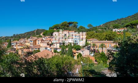 Distant view of the old village of Bormes-les-Mimosas, France, located on the French Riviera (Cote d'Azur), in the French department of Var Stock Photo