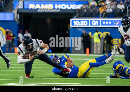 Los Angeles Rams linebacker Daniel Hardy (44) and safety Jake Gervase (39)  take a break while playing the Los Angeles Chargers during an NFL preseason  Football Game Saturday, Aug. 13, 2022, in