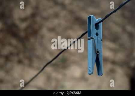 plastic clips to hang freshly washed clothes Stock Photo