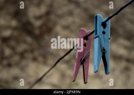 plastic clips to hang freshly washed clothes Stock Photo