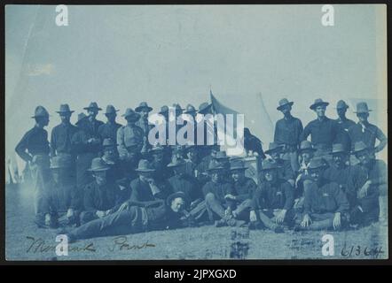 Theodore Roosevelt's Rough Riders, enlisted men and bird mascot, at military camp, Montauk Point, New York Stock Photo