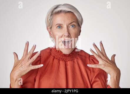 Wow, shock and surprised old woman amazed over success of new beauty, wellness and facial skincare routine portrait. A girl happy with her healthy Stock Photo