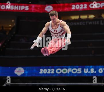 August 20, 2022: Brody Malone of Stanford flies above the high bar during the 2022 U.S. Gymnastics Championships at Amalie Arena in Tampa, FL. Kyle Okita/CSM Stock Photo