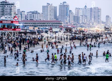 Gaza City, Palestine. 20th Aug, 2022. Palestinians spend time at the beach of Gaza during a hot day in Gaza Strip. (Photo by Mahmoud Issa/SOPA Images/Sipa USA) Credit: Sipa USA/Alamy Live News Stock Photo