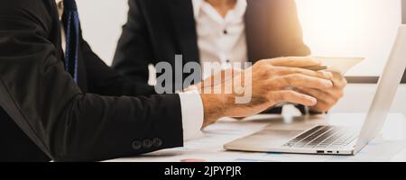 Successful connection concept, legal and businessman advisor, two business people talking, planning analyze investment and marketing on laptop compute Stock Photo