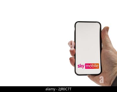Cardiff Mid glamorgan Wales UK  August 20 2022 Person holding cellphone with logo of Sky Mobile digital services Stock Photo