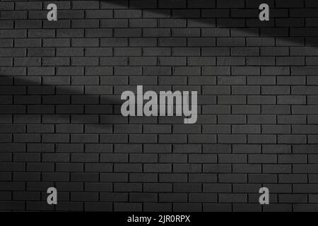 Black brick wall background. Dark brickwork. Copy space. High quality photo Stock Photo