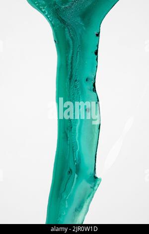 Abstract fluid acrylic painting. Marbled blue abstract background. Hand painted background with mixed liquid blue and green paints. Liquid marble Stock Photo