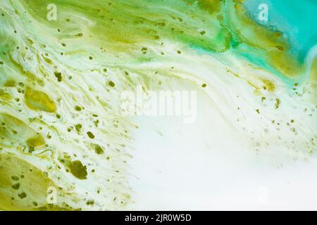 Abstract fluid acrylic painting. Marbled blue abstract background. Hand painted background with mixed liquid blue and green paints. Liquid marble Stock Photo