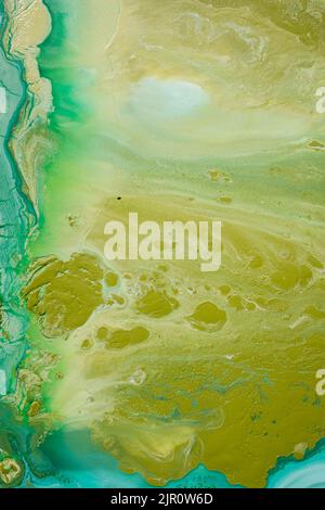 Abstract fluid acrylic painting. Marbled blue abstract background. Hand painted background with mixed liquid blue and green paints. Liquid marble Stock Photo
