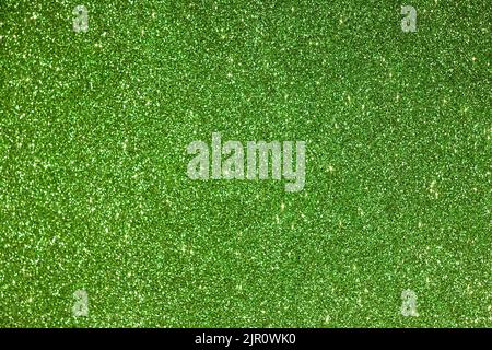 Shiny green foamiran background with glitter effect Stock Photo