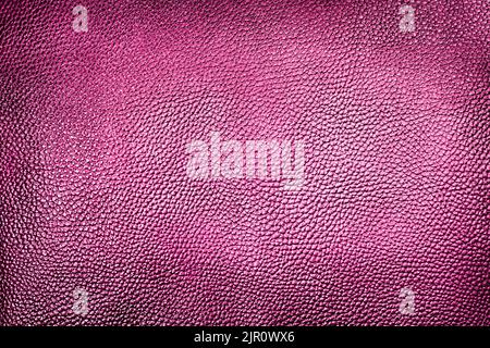 Classic pink genuine leather background texture closeup Stock Photo