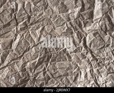 Crumpled craft paper background texture. Copy space Stock Photo