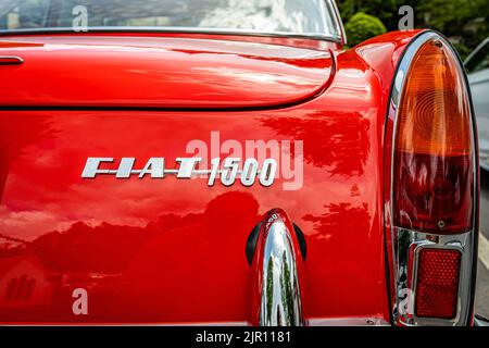 Highlands, NC - June 10, 2022: Close up detail view of  a 1966 Fiat 1500 Spider Hardtop Coupe taillight at a local car show. Stock Photo