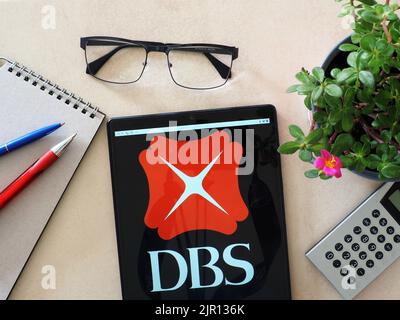 In this photo illustration, DBS Bank (Hong Kong) Limited logo seen displayed on a tablet Stock Photo