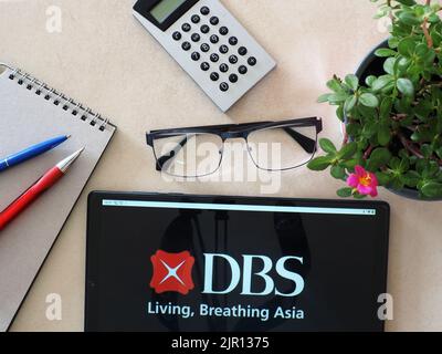 In this photo illustration, DBS Bank (Hong Kong) Limited logo seen displayed on a tablet Stock Photo