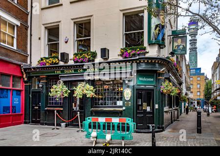 The Duke Of York pub a Victorian pub on Rathbone Street, with the BT Tower in the distance , Fitzrovia ,London Stock Photo