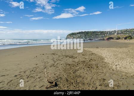 Clifton Beach in winter and hillside suburb of Scarborough Christchurch New Zealand Stock Photo