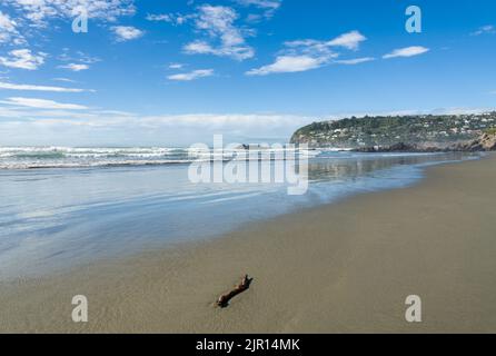 Clifton Beach in winter and hillside suburb of Scarborough Christchurch New Zealand Stock Photo