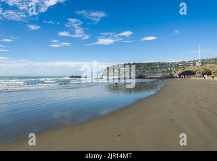 Clifton Beach in winter and hillside suburb of Scarborough Christchurch New Zealand Stock Photo
