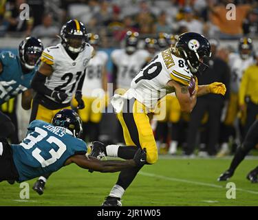 Pittsburgh Steelers wide receiver Gunner Olszewski (89) catches a pass in  front of cornerback Madre Harper (38)) during an NFL football team's  training camp workout in Latrobe, Pa., Tuesday, Aug. 1, 2023. (