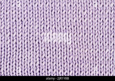 Purple Knitted fabric background or texture Stock Photo
