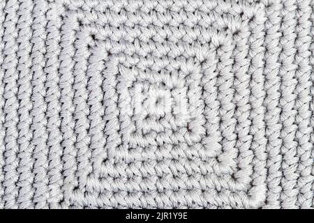 Grey Knitted fabric background or texture Stock Photo