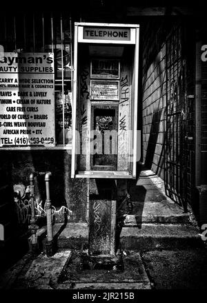 Phone Booth No 2. From an ongoing series of Black and White photos exploring a now outdated and almost forgotten technology in and around the Toronto Stock Photo