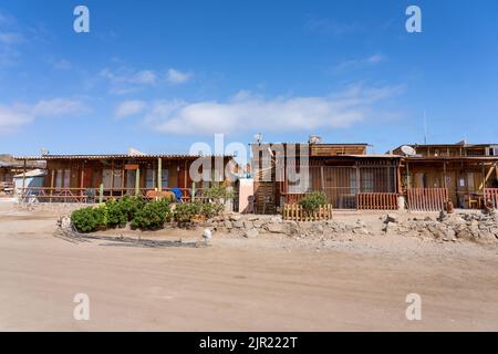 Fishermen's houses in Caleta Pan de Azucar, Pan de Azucar National Park in the Atacama Desert of Chile. Stock Photo