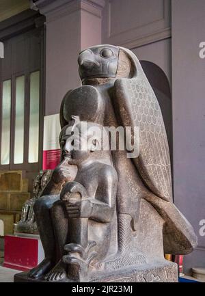 Cairo, Egyptian Museum, Ramses 2 as a child, protected by the hawk god Horoun. Granite, from Tanis. Cryptographic name of the king : Ra Mess Sou. Stock Photo