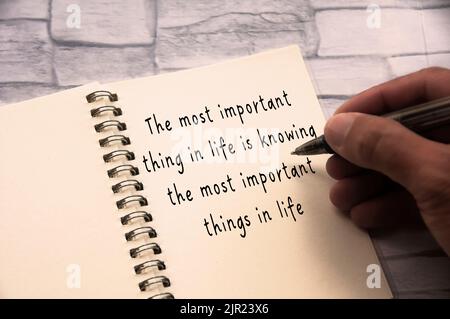 Inspirational quote text - The most important thing in life is knowing the most important things in life. Inspirational concept. Stock Photo