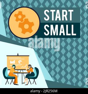 Text sign showing Start Small. Business idea Small medium enterprises start up Business entrepreneurship Colleagues Sitting On Desk With Laptop Papers Stock Photo