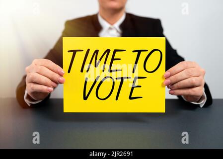 Text showing inspiration Time To Vote. Word for Election ahead choose between some candidates to govern Businesswoman Holding Note With Important Stock Photo