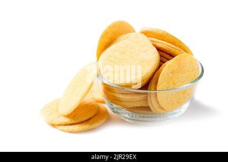 Round Crackers biscuits in glass bowl isolated on white background, Dry cracker cookies isolated, snack and fastfood concept Stock Photo