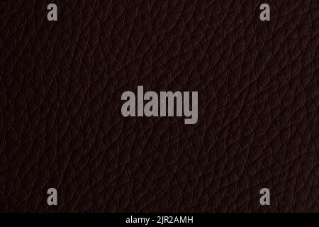 A brown leather background in closeup Stock Photo