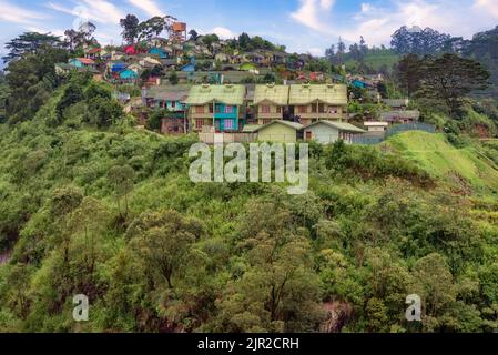 Small village in the mountains in the Nuwara Eliya district, Sri Lanka. Many villages like these meet along the railway that starts from Kandy Stock Photo
