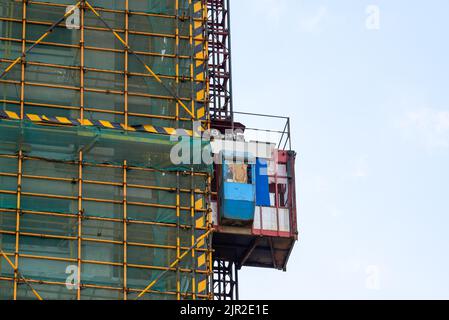 Close-up of temporary construction elevator used on building site Stock Photo