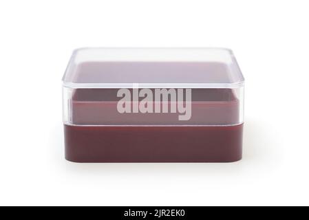 Square plastic box with transparent lid isolated on white. Stock Photo
