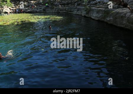 Dzibilchaltun, Mexico, :Cenote Xlacah situated in Dzibilchaltun zona archeologica area in Mexico Stock Photo