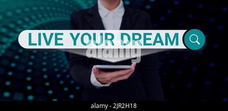 Text caption presenting Live Your Dream. Word Written on Motivation be successful inspiration happiness achieve goals Businessman in suit holding open Stock Photo